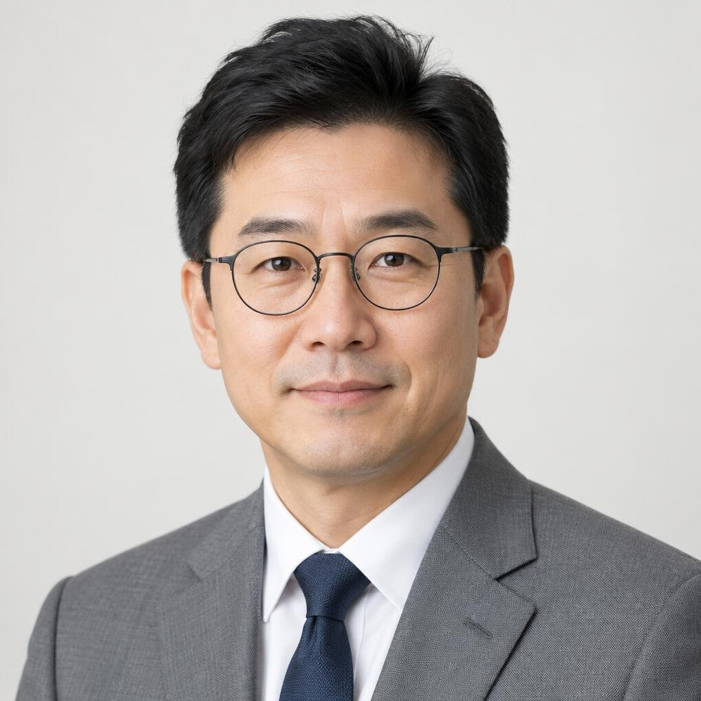 Portrait of a male faculty member with glasses