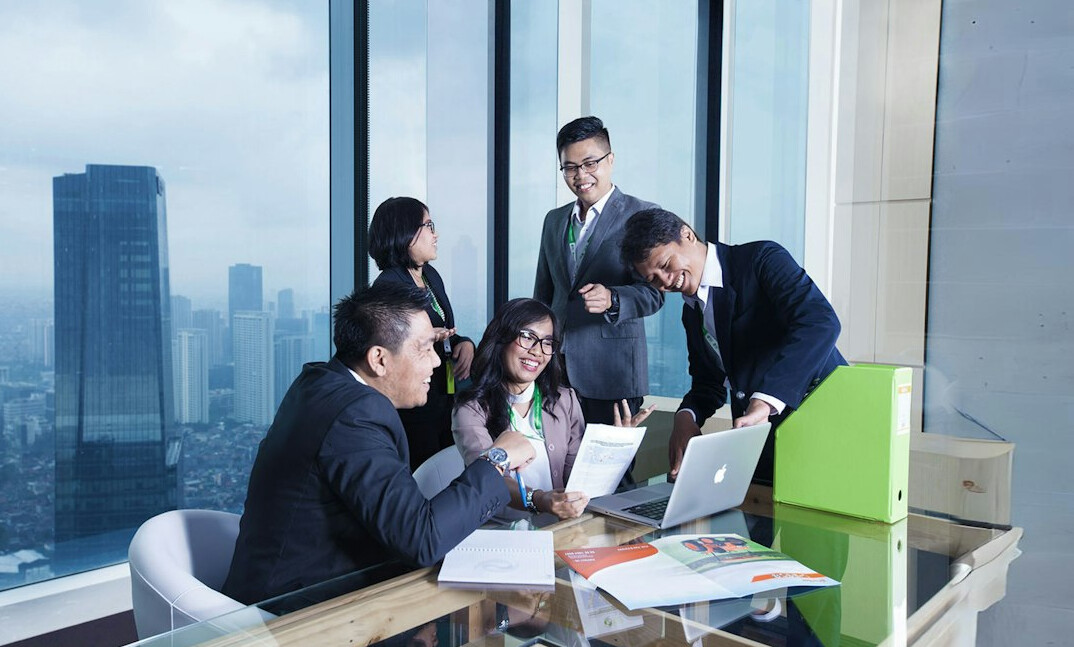 business leaders in strategy meeting