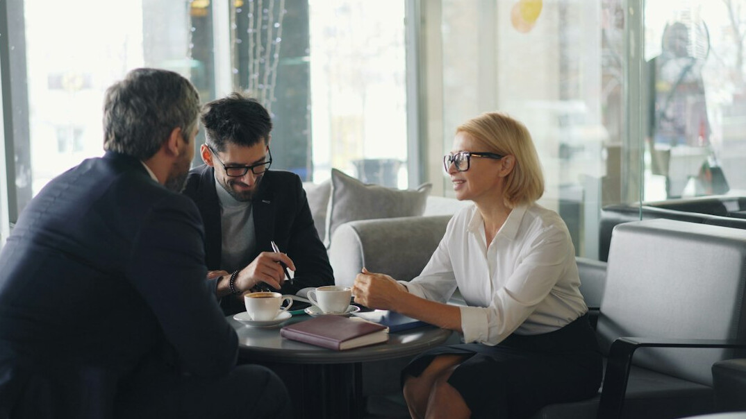 woman leading business meeting